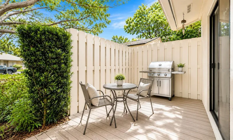Grill area off kitchen with patio
