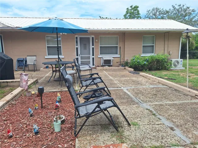 Entrance view with walkway/patio