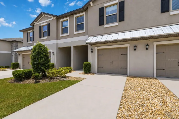 Front exterior with attached garage