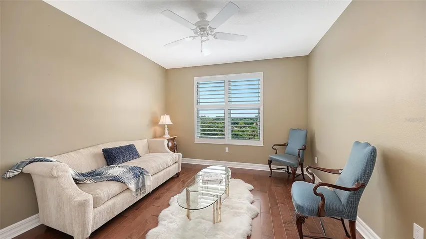 The third guest room offers generous space and abundant natural light.