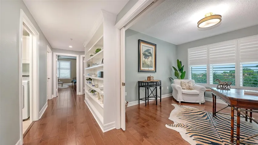 Custom built-ins add both character and functionality to the hallway.