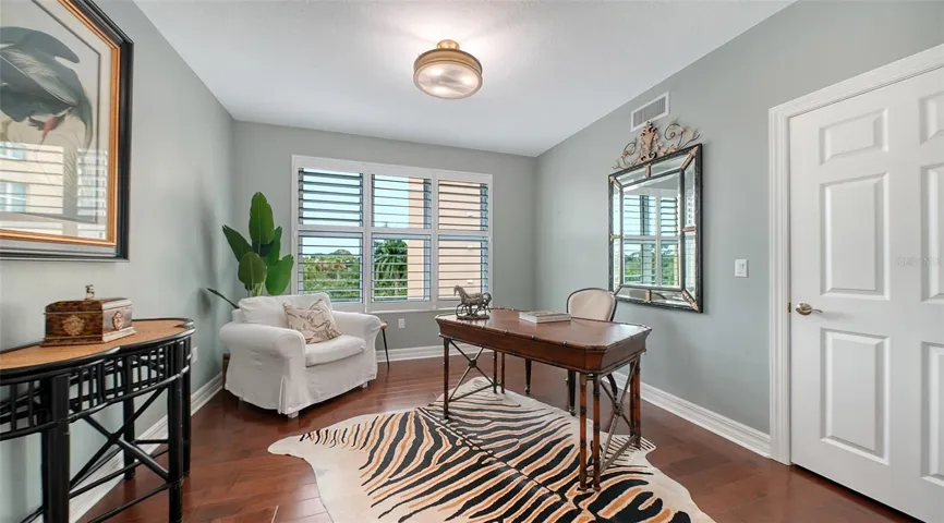 A flexible den provides the ideal space for a home office, study, or guest room.