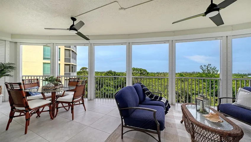 The terrace provides a front-row seat to tranquil preserve and water views.