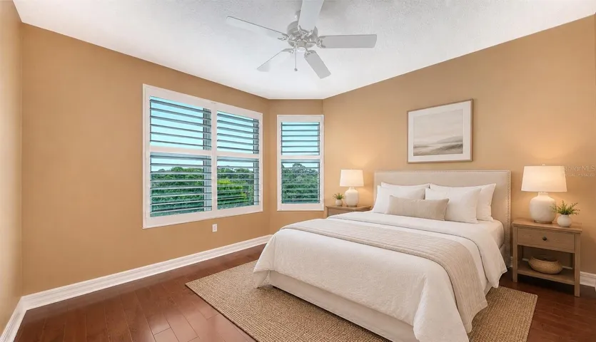 *Virtually staged* Guests will enjoy comfort and privacy in this beautifully appointed bedroom.