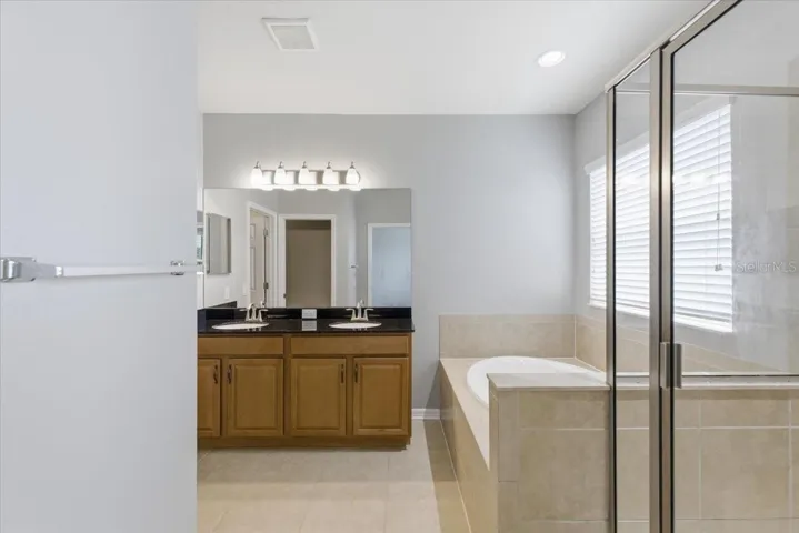 Primary ensuite with walk-in closet