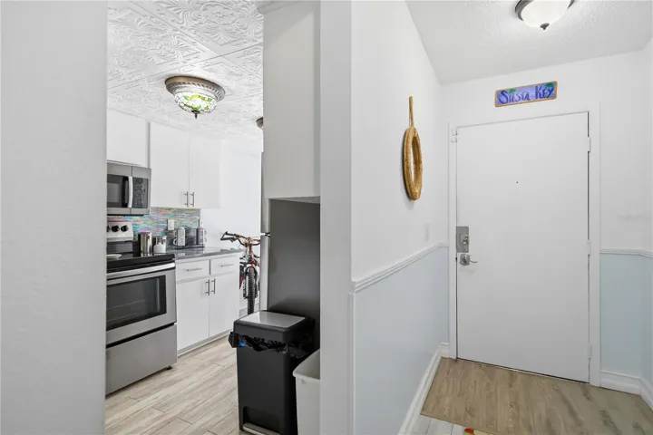 Foyer / Entrance and Peek into the Kitchen