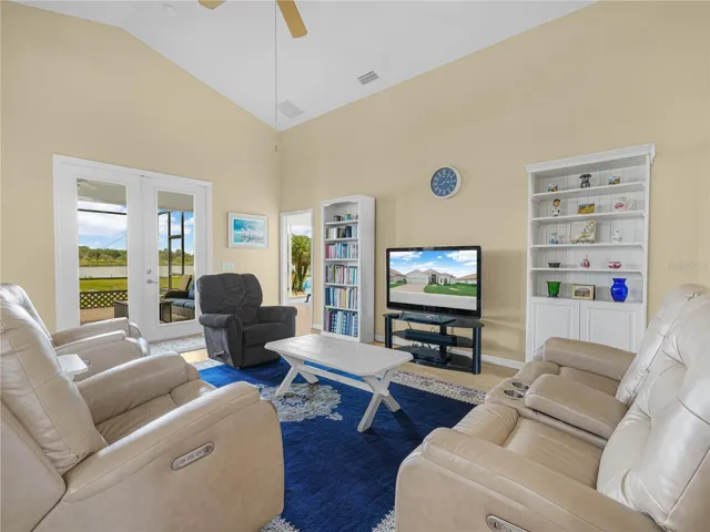 Living Room Area. French Doors lead to the Outdoor Lanai