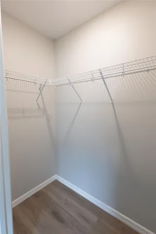 Closet in primary bedroom