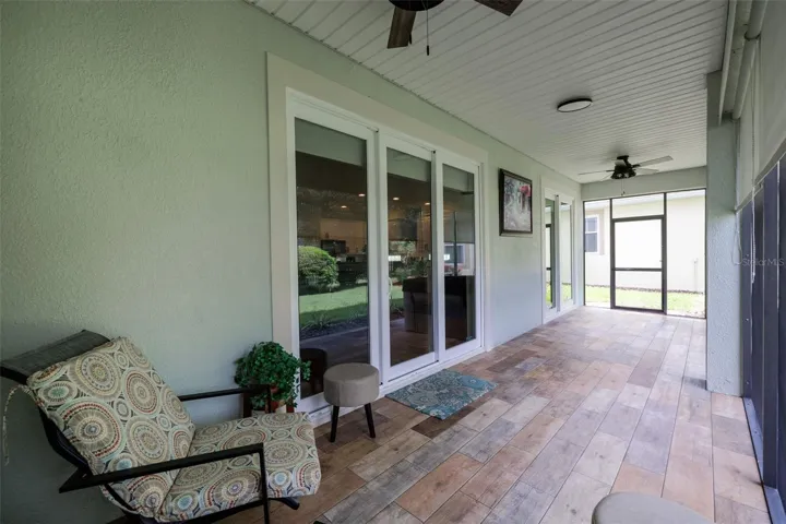 Lanai with wood like tile flooring