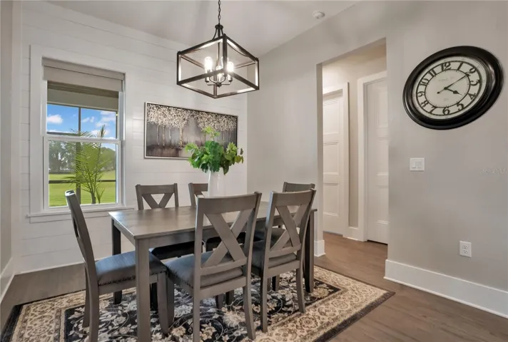 Dining area conveniently located adjacent to the kitchen and great room, providing an inviting space for casual meals and entertaining guests.