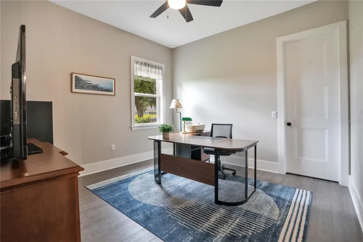 Versatile third bedroom ideal as a home office, study, fitness room, hobby space, or additional guest accommodation.