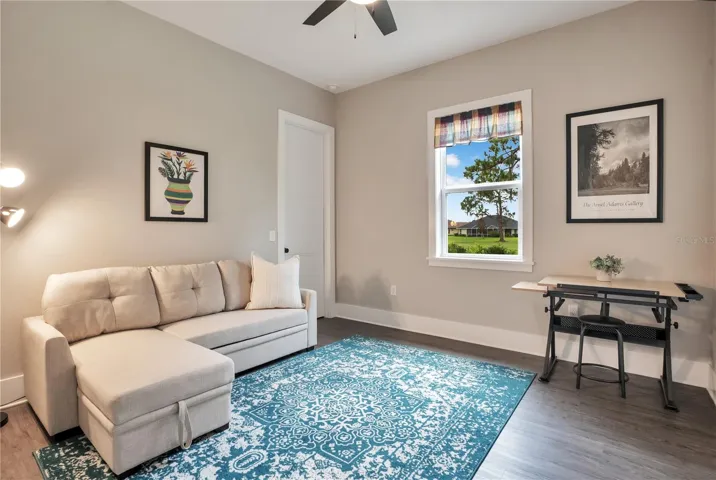 Versatile fourth bedroom perfect as a playroom, second living area, or additional guest retreat.