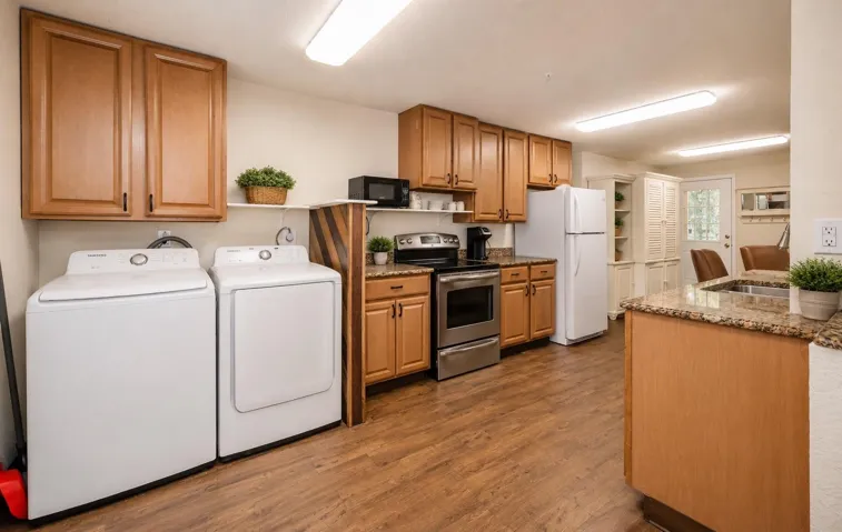 Two bedroom apartment living space with full size washer and dryer.