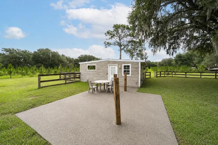 A dedicated stable/chicken coop and storage room.
