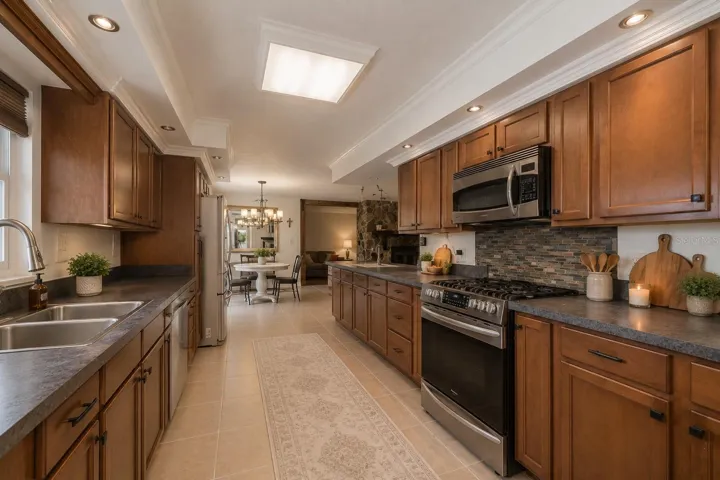 Thoughtfully designed kitchen featuring a gas range and generous storage.