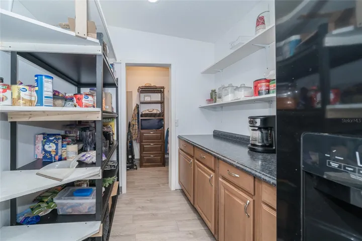 Oversized pantry offers exceptional storage and a convenient second refrigerator.