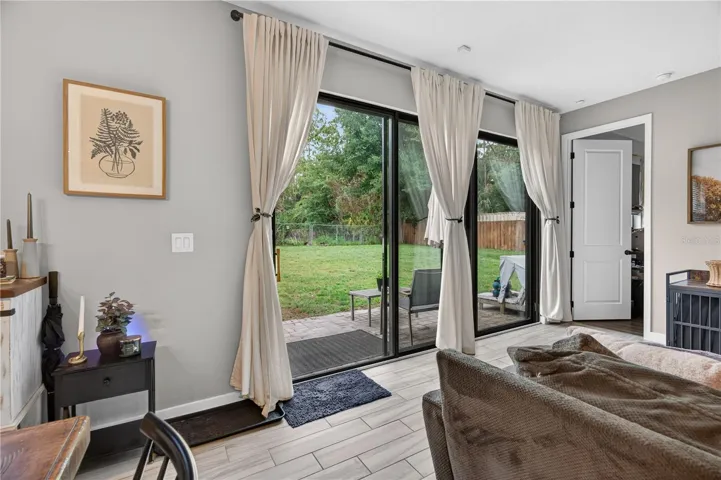 Sliding door leading to the backyard