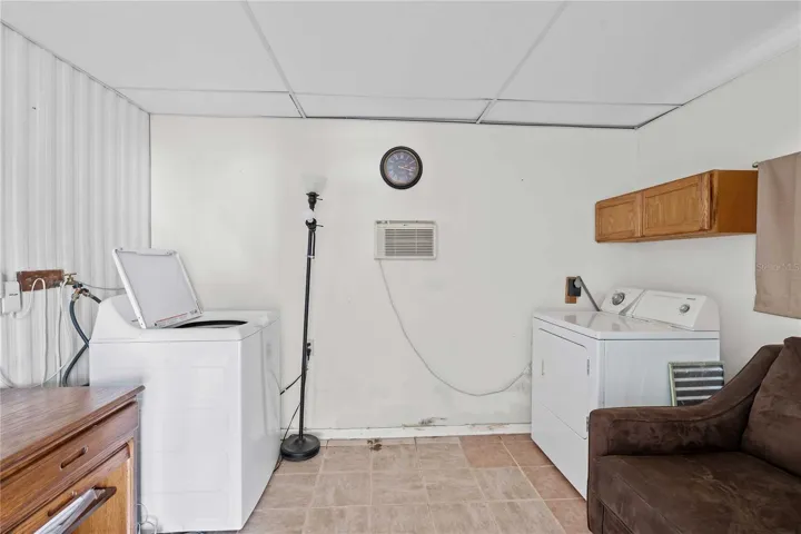 Laundry room and storage area.