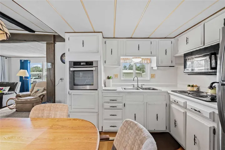 Open kitchen with living room.