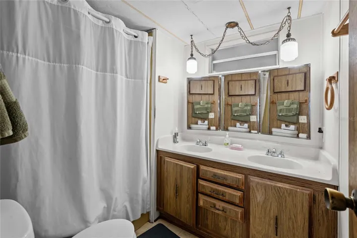 Bathroom one has double vanity.