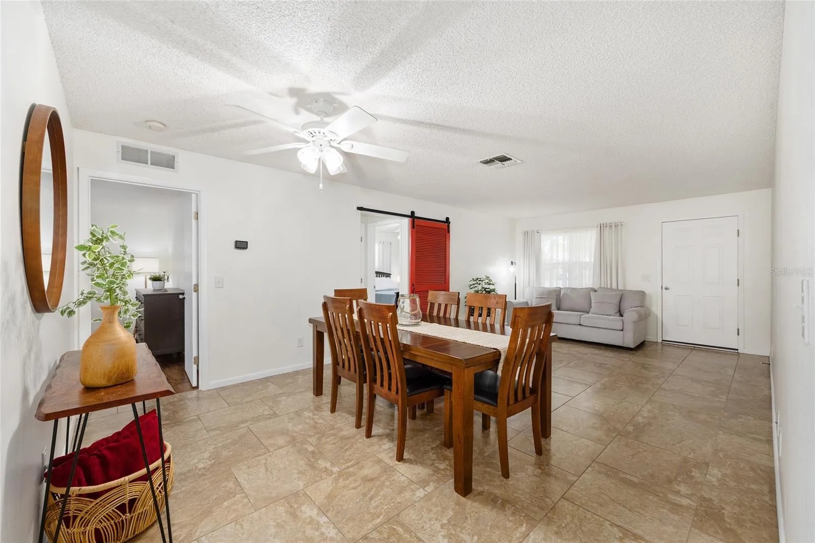 Another view of the dining room/living room combination, showcasing the open and inviting layout.