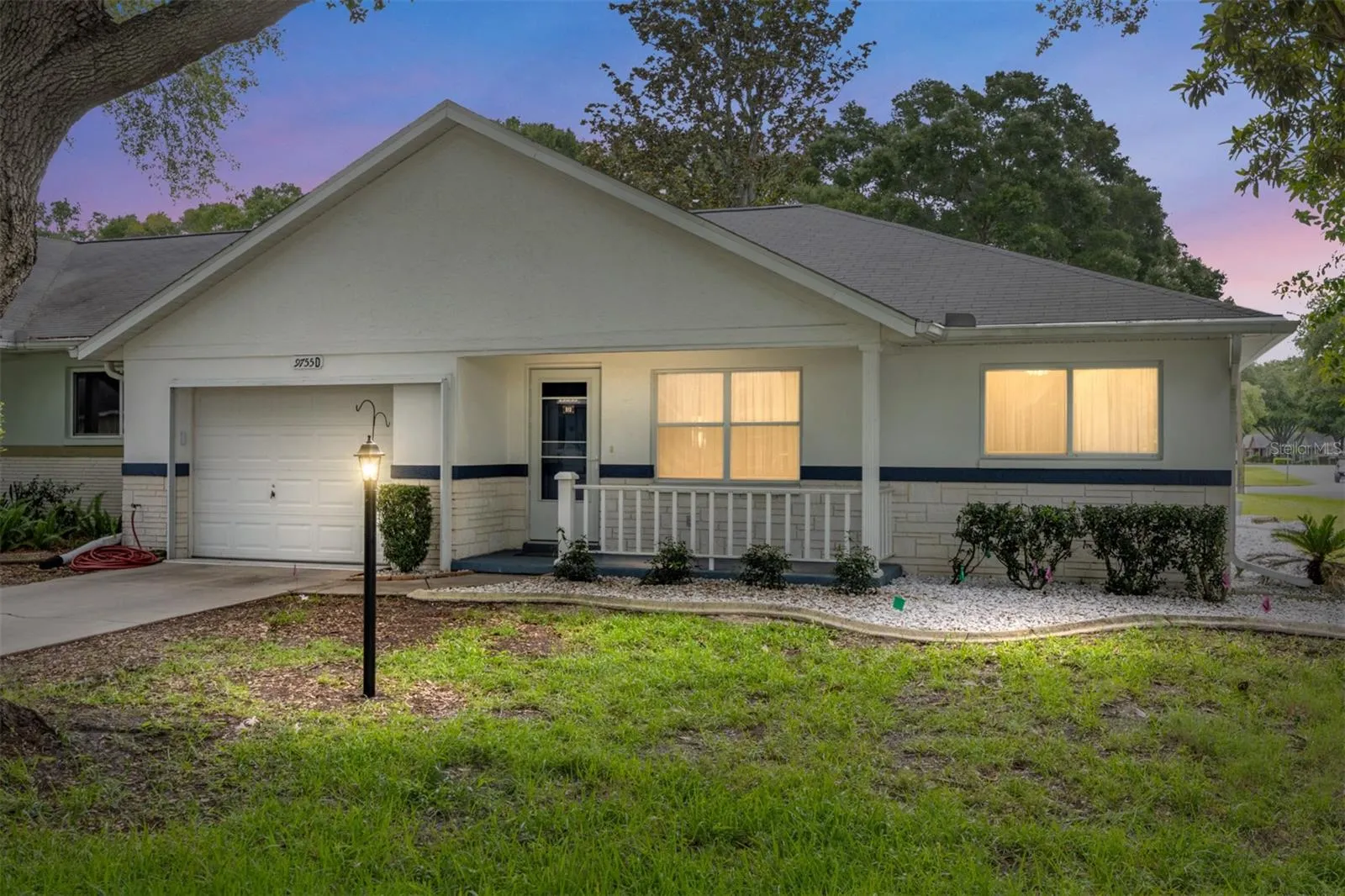 Fully furnished end-unit Delphina model villa offering added privacy, natural light, and a move-in-ready feel.