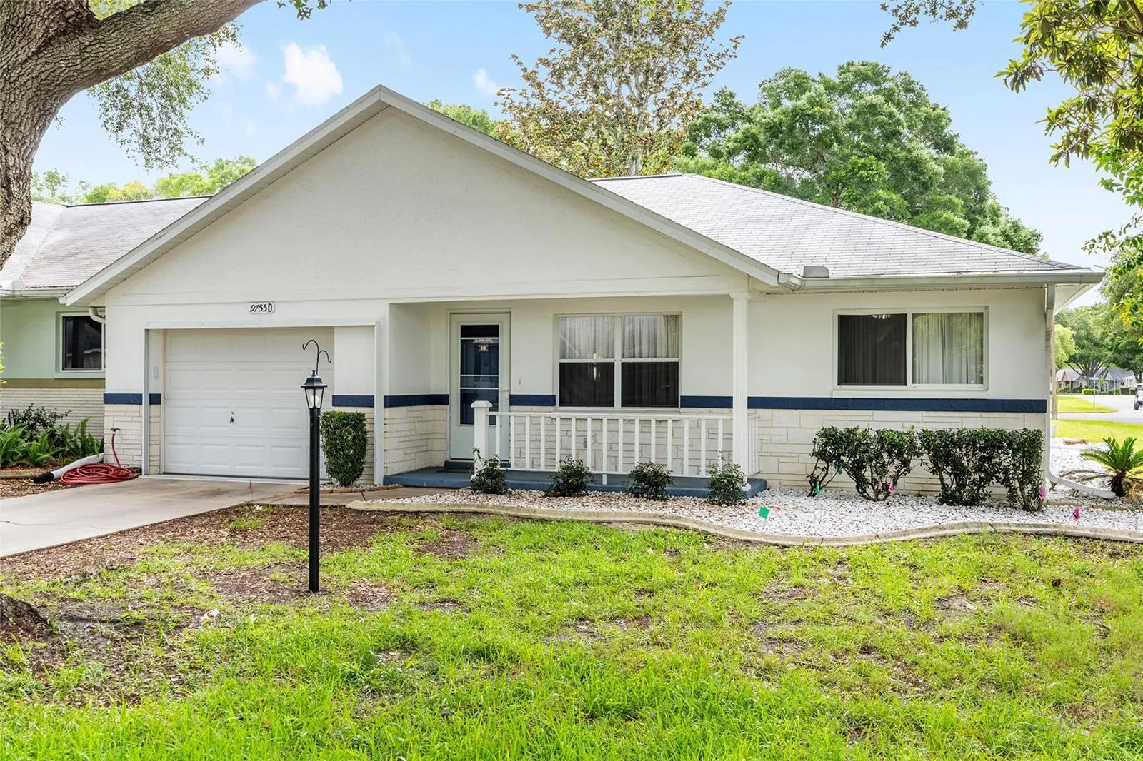 Fully furnished end-unit Delphina model villa offering added privacy, natural light, and a move-in-ready feel.