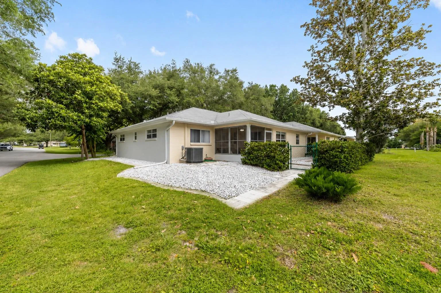 Large corner lot offers added outdoor space.