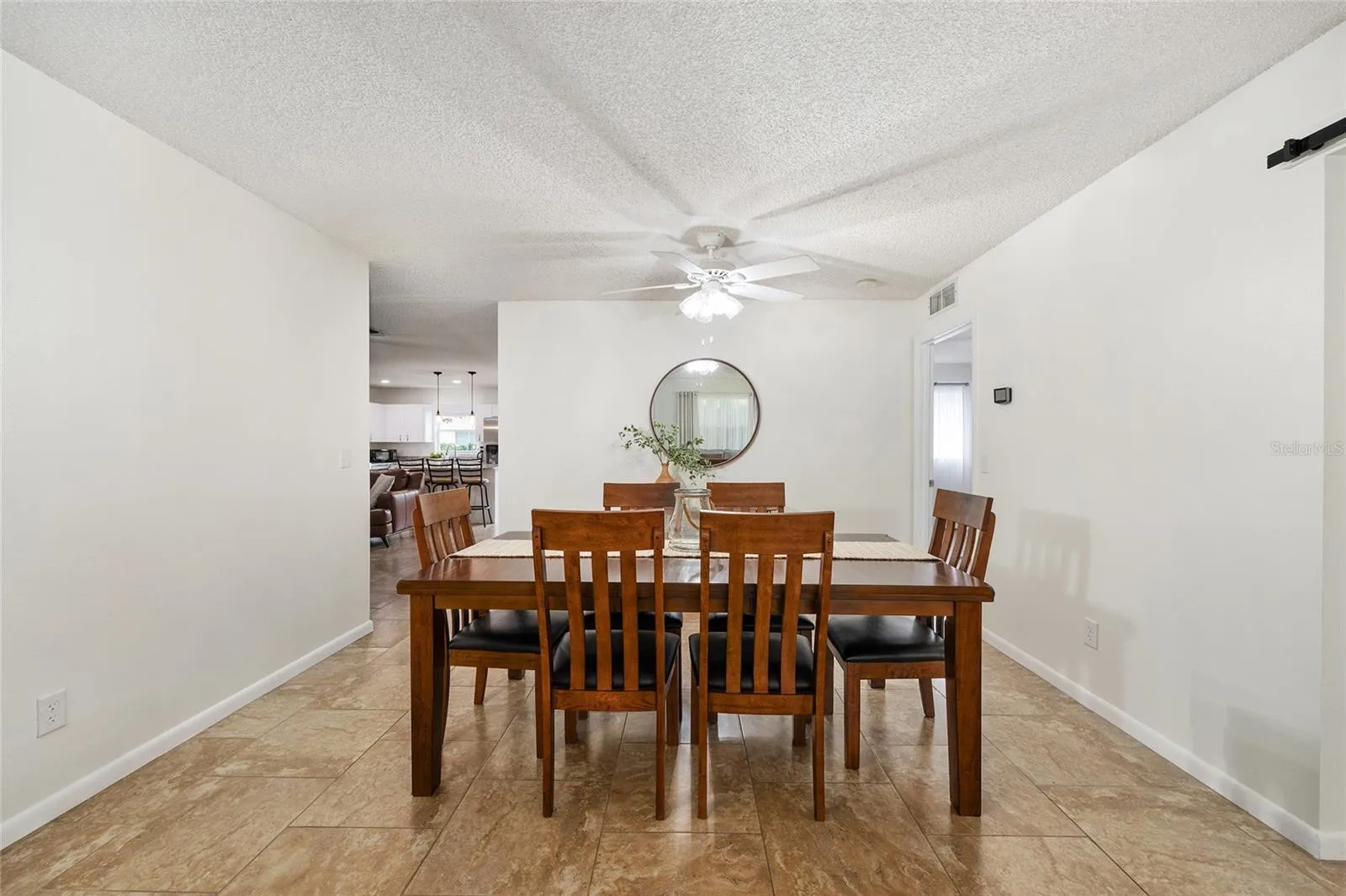 Formal dining area offers an inviting space for meals, gatherings, and entertaining.