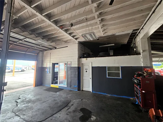 Main bays with dual 10'x10' overhead doors. Automotive lift not included