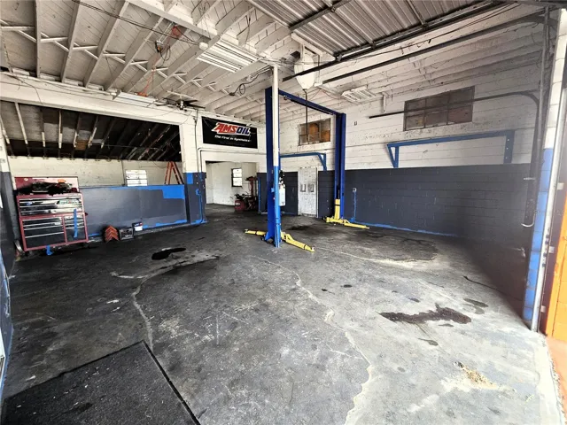 Main bays with dual 10'x10' overhead doors Automotive lift not included