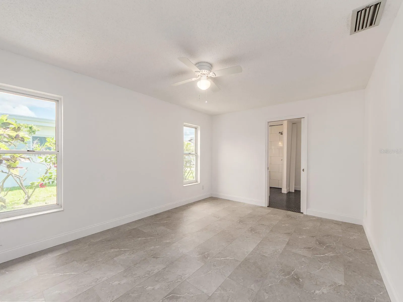 Primary bedroom off kitchen/ living area. With private ensuite