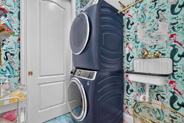 Upstairs laundry room close to primary suite. Large storage closet attached.