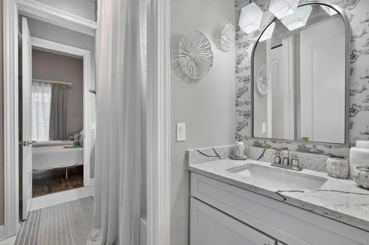 Jack and Jill bath between two downstairs guest rooms