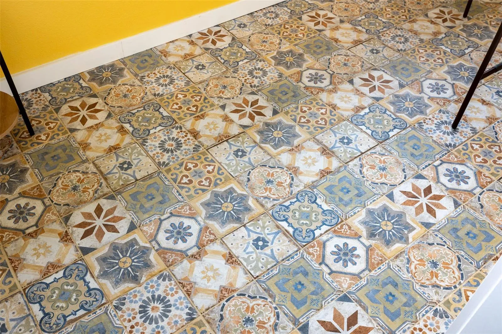 Detail view of custom tile floor in 3rd floor Balcony room.