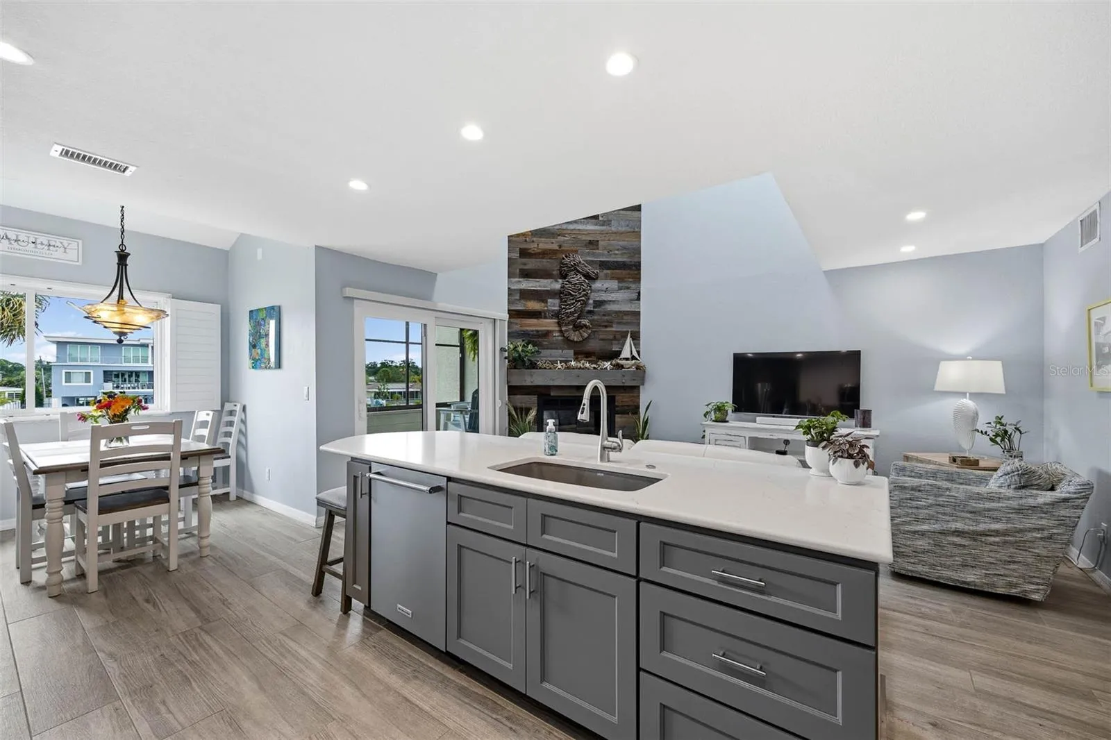 Fully renovated kitchen with double sided cabinets at the Island.