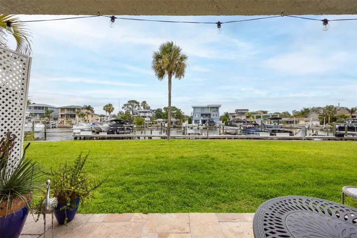 View from the ground floor patio to the creek and docs.