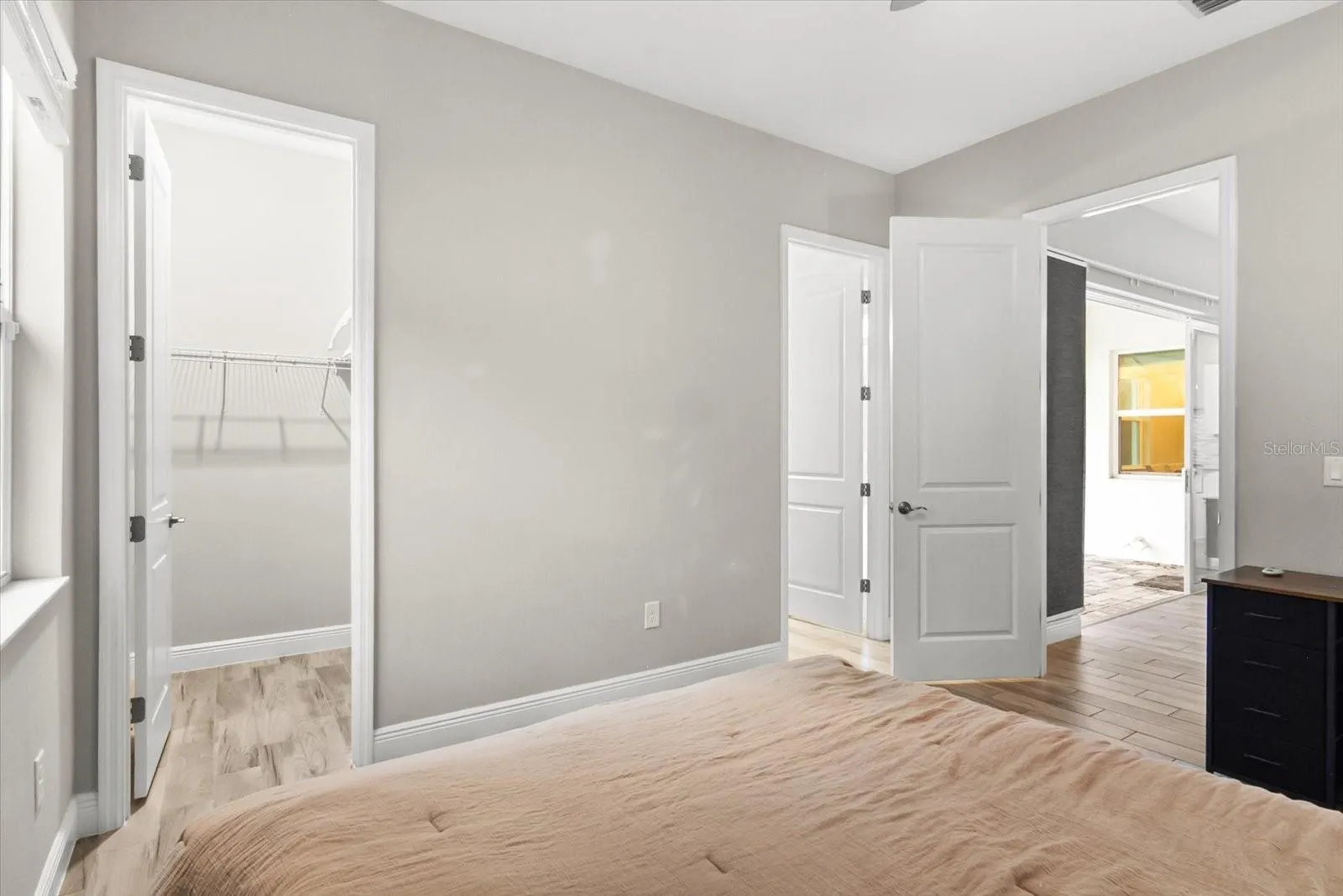 Bedroom 4 with ensuite bathroom and walk in closet.