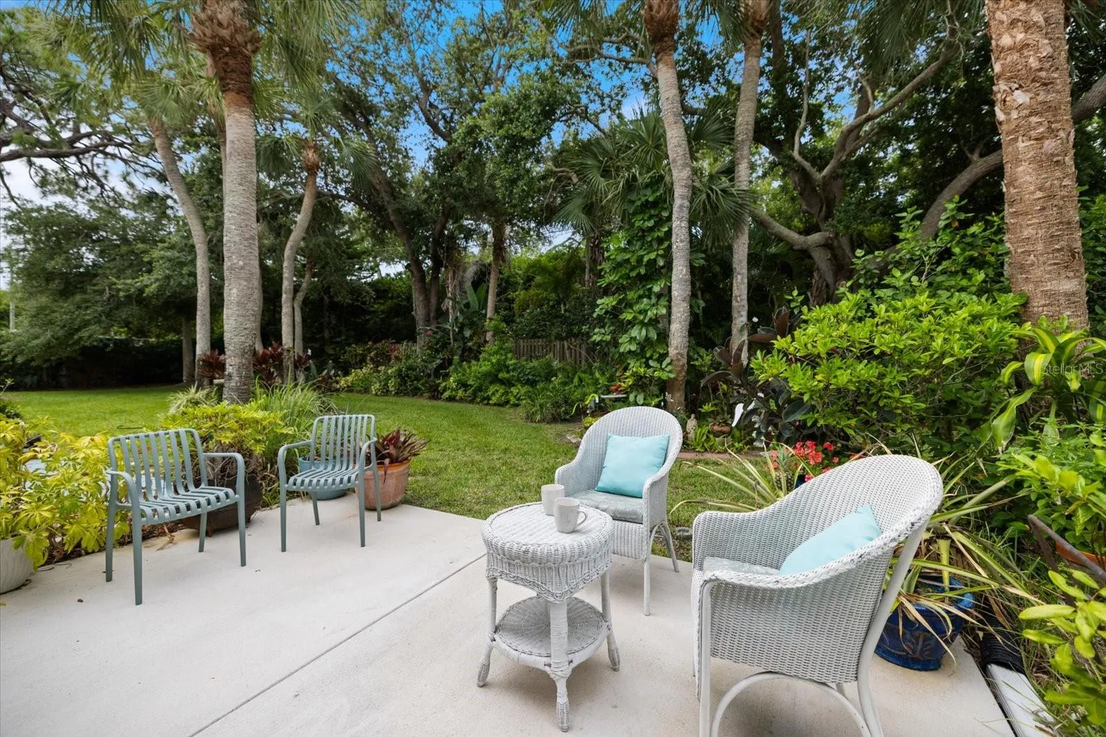 Tropical backyard. Barbeque, enjoy morning coffee, add your own potted garden pleasures!