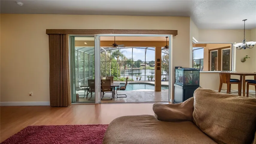 Great room to back patio &amp; pool with 4 stackable doors so this opens up to all the outside living space
