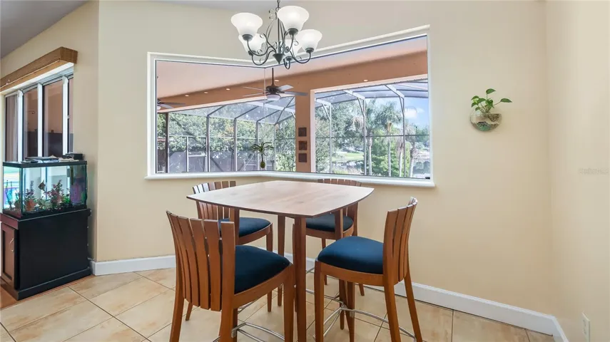 Dinette off kitchen with back patio/pool/beach &amp; Lake Katherine views