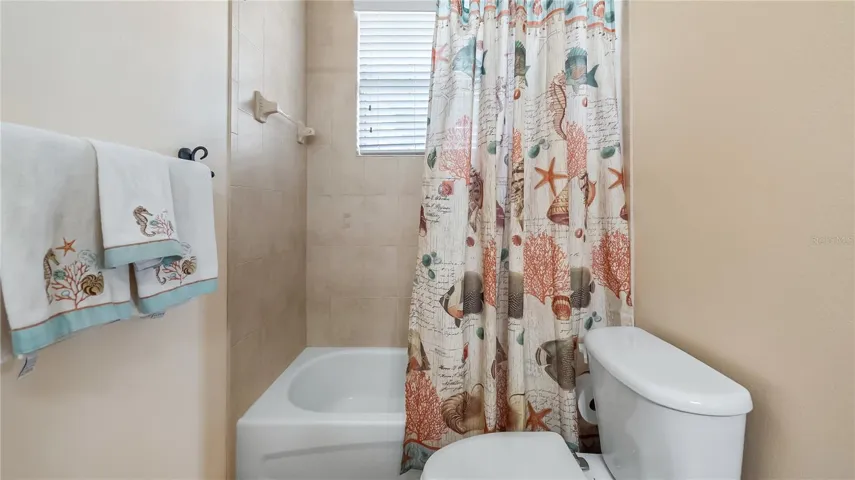 Guest bathroom between bedroom 2 &amp; 3, double sinks and tub/shower