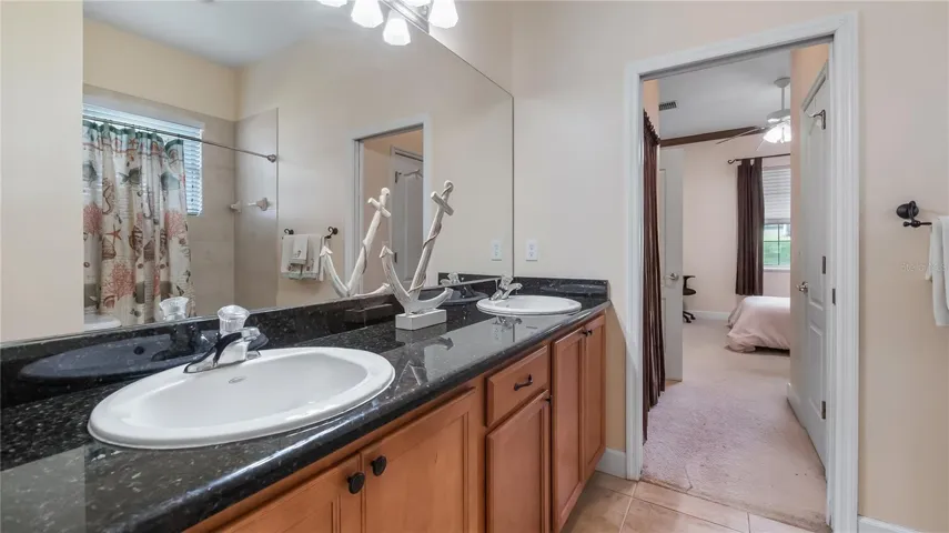 Guest bathroom between bedroom 2 &amp; 3, double sinks and tub/showe