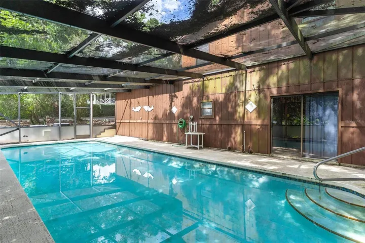 Screened enclosed swimming pool