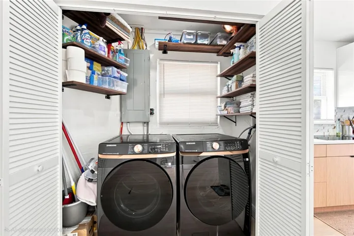 Laundry room located in Kitchen.