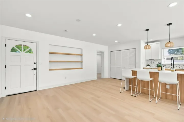 AI used to add chairs and show what shelving would look like.