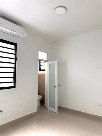 Master Bedroom with half bathroom an A/C