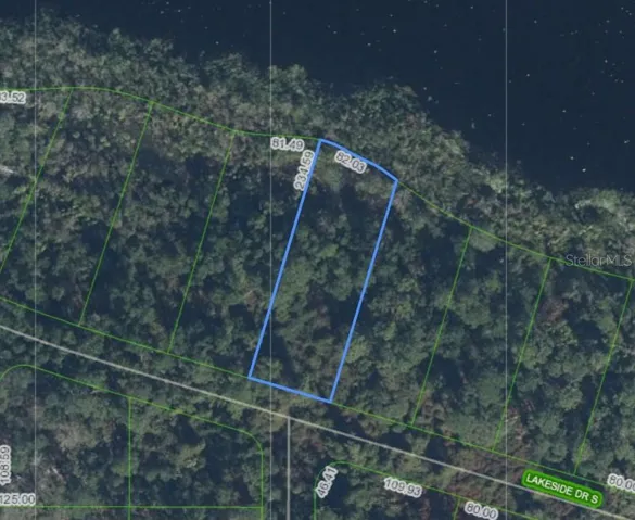 82 feet of water front acess to Wolf Lake. Don't delay!