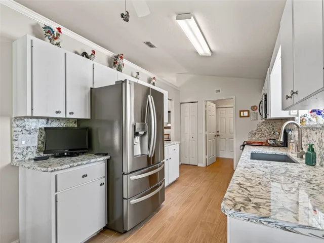 New Stainless Appliances & New Wood Look Tile Flooring