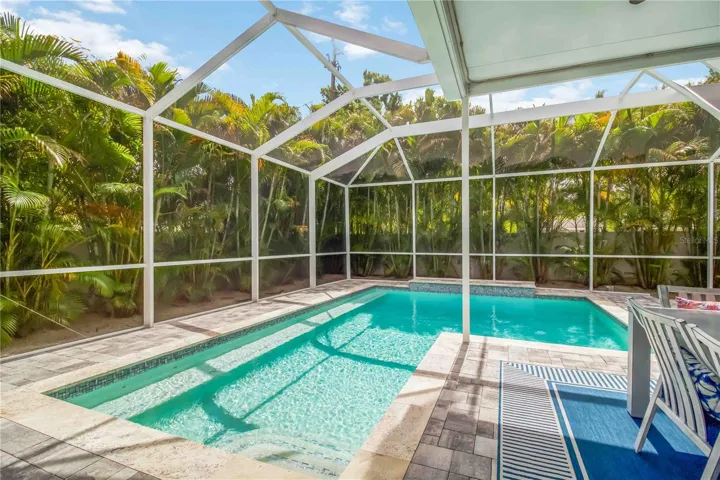 Enjoy complete privacy in the sparkling pool and screened lanai